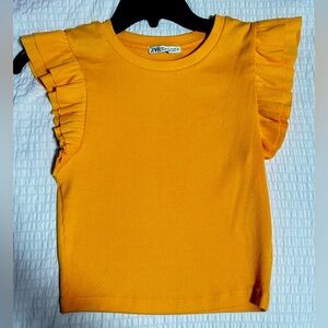 Orange ruffle top